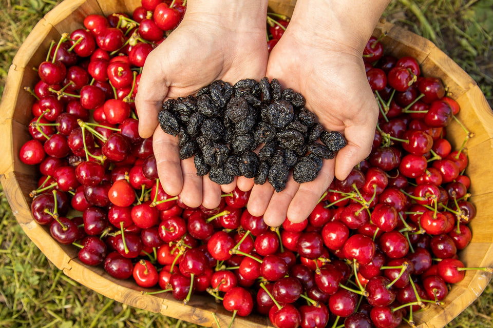 Cherries and dried with hands